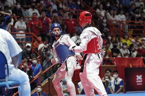 SEA Games: Philippines’ Kurt Barbosa retains taekwondo gold.